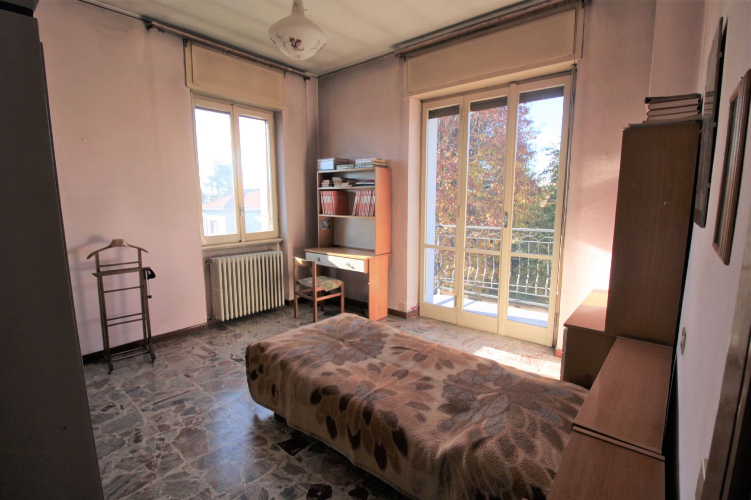 SPLENDIDO TRILOCALE CON GIARDINO E POSTO AUTO