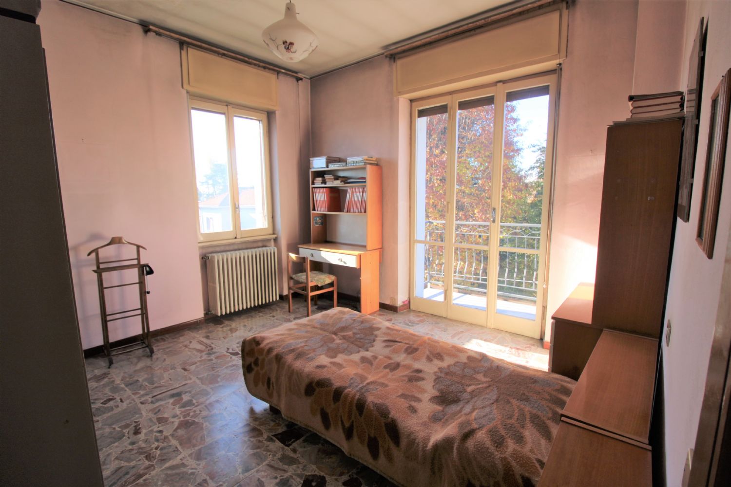 SPLENDIDO TRILOCALE CON GIARDINO E POSTO AUTO